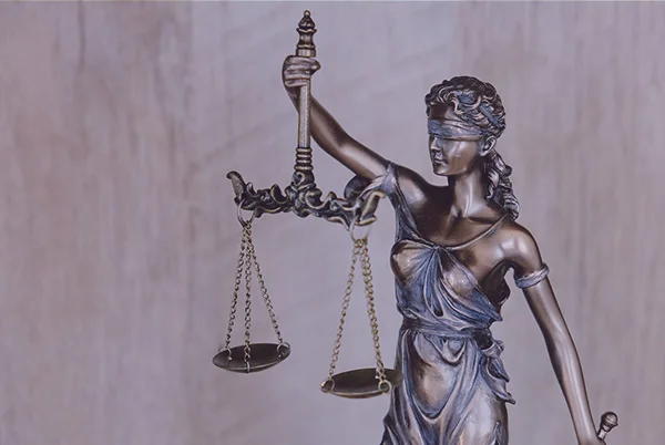 An image of a balance scale. It symbolizes the unbiased comparison between the law of assumption and the law of attraction, which are two different ways of manifesting your desires