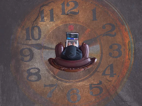 A person sitting in the center of the clock drawing. It's a perfect symbol of revising one's past using the Neville Goddard revision technique. 