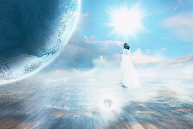 An image of a woman in a white dress holding a glowing orb. It represents the concept of the law of attraction and our power to use it.