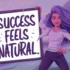A woman standing confidently with one hand on her hip and the other holding a whiteboard with the words "Success feels natural"